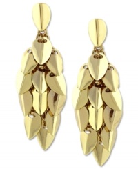 Leaves of gold. Vince Camuto's chandelier earrings make an attractive choice with leaf-shaped clusters in golden tones. Crafted in gold tone mixed metal. Approximate drop: 3-1/4 inches.