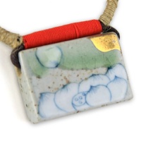 Painted Aqua Green And Blue Lotus With Fine Gold Detail - Cherry Red And Hemp Woven Accents - Gray Musk Hand Made Ceramic Block Pendant - Dark Brown Adjustable Necklace