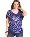 Leave a lasting impression with Eyeshadow's short sleeve plus size top, featuring a sequin-print front and cutout back.