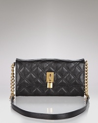 Marc Jacobs' chic quilted leather wallet boasts great versatility with a detachable crossbody strap.