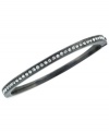 Sleek and stunning. Vince Camuto's thin bangle bracelet is crafted from hematite-tone mixed metal with a dazzling array of glass crystal accents for a fashion infusion. Approximate diameter: 3-1/2 inches.