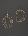 A mix of hoops in white, rose and yellow gold make up these artful earrings from Lana.