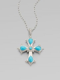 This cross of vibrant turquoise is framed in sterling silver and punctuated by luminous diamonds.Diamond, 0.15 tcw Sterling silver Pendant length, about 2½ ImportedPlease note: Chain sold separately 