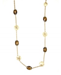 Great lengths: Jones New York's long chain necklace is elegantly enhanced by smoky topaz-hued stones and disc accents. Crafted in gold tone mixed metal with plastic stones. Approximate length: 36 inches.