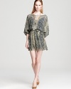 Ever-chic snake print adorns this flowing Aqua tunic dress, perfect alone with heels or paired with skinny jeans.