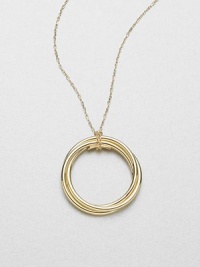 Radiant 18k gold in a wrapped circle design on a delicate link chain. 18k goldLength, about 31Pendant size, about 1.5Lobster clasp closureMade in Italy