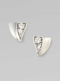 From the Thorn Collection. Triangular, thorn-shaped studs of gleaming sterling silver, with a concave profile on one side and sparkling white sapphires on the other.White sapphireSterling silverLength, about ½Post backImported