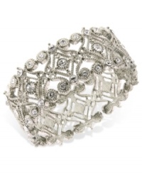 Glistening glass stones and scrolling designs lend appeal to this 2028 bracelet. Crafted in silver tone mixed metal. Approximate length: 7 inches.