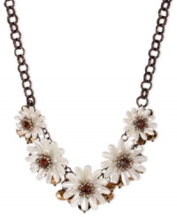 Beauty is in bloom. This frontal necklace from Betsey Johnson is crafted from brown gold-tone mixed metal with topaz-colored beads and crystals, as well as pearl-tone petals, adding a vibrant touch. Approximate length: 16 inches + 3-inch extender. Approximate drop: 1-1/4 inches.