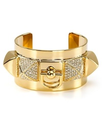 Rock a heavy metal: this Juicy Couture cuff works an edgy vibe, cast in plated metal with chunky stone accents.