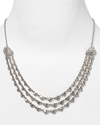 Give into glitz with this silver chain and crystal necklace from Carolee. Decked in dazzling crescent stations, it will add the perfect finish to any evening ensemble.