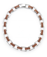 Industrial chic. This eclectic necklace from the Lauren Ralph Lauren collection features heavy rectangular links in concert with a trendy leather band. Set in silver tone mixed metal. Approximate length: 18 inches.