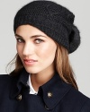 Laid-back meets luxe in Surell's slouchy hat with a large, rabbit fur pom-pom.