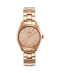 This classic, modern timepiece from kate spade new york boasts sparkling crystal markers and a luxe rose gold finish.