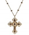 Demonstrate your faith with this elegant long necklace from Style&co. Displays an intricate cross pendant embellished with brown accents. Crafted in gold tone mixed metal. Approximate length: 36 inches. Approximate drop: 3-1/2 inches.