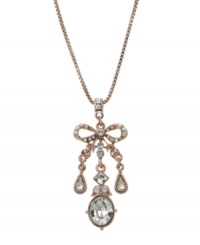 Add sparkle and shine in an instant. This pretty bow necklace by 2028 features a chic, rose gold tone mixed metal setting decorated with sparkling crystals. Approximate length: 16 inches + 3-inch extender. Approximate drop: 2-1/2 inches.