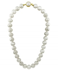 From the island of Mallorca, Spain this beautiful strand of organic man-made pearls (12 mm) is hand-strung and features an 18k gold over sterling silver clasp. Approximate length: 16-18 inches.