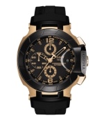 Inspired by the world of moto-racing, the T-Race watch by Tissot blends gold-winning details with speedy precision. Crafted of black rubber strap and round rose-gold PVD stainless steel case. Black chronograph dial features tachymeter scale, minute track, date window at three o'clock, three hands, numerals at six and twelve o'clock, three subdials and logo. Swiss automatic movement. Water resistant to 100 meters. Two-year limited warranty.