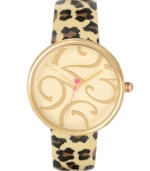 Go on the prowl with this exotic creation from Betsey Johnson. Watch crafted of leopard print leather strap and oversized round gold tone mixed metal case. Champagne dial features large gold-tone numerals, hour and minute hands, signature fuchsia second hand and logo. Quartz movement. Water resistant to 30 meters. Two-year limited warranty.