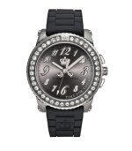 Even nice girls have a dark side. Pedigree watch by Juicy Couture crafted of black synthetic jelly strap and round stainless steel case. Bezel crystallized with Swarovski elements. Gunmetal sunray dial features applied numerals, black minute track, three hands and crown logo. Quartz movement. Water resistant to 30 meters. Two-year limited warranty.