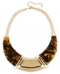 Go for non-stop glam with this Haskell frontal necklace. Pairs acrylic tortoise stones with gold-tone accents for a stunning effect. Crafted in gold tone mixed metal. Approximate length: 17 inches + 3-inch extender. Approximate drop: 1-1/2 inches.