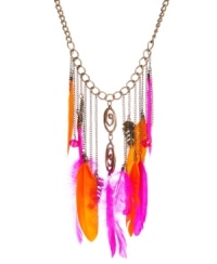 Stir up some drama. The hot combination of fuchsia and orange feathers on Haskell's frontal drama necklace make it a-must for every fashionistas collection. Set in brass-plated mixed metal. Approximate length: 30 inches + 3-inch extender. Approximate drop: 6-3/4 inches.