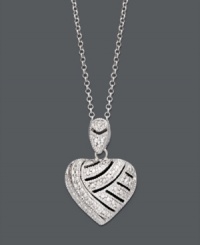 A look you'll simply adore. Victoria Townsend's lovable heart pendant shines with the addition of sparkling diamonds accents. Setting and chain crafted in sterling silver. Approximate length: 18 inches. Approximate drop: 8/10 inch.