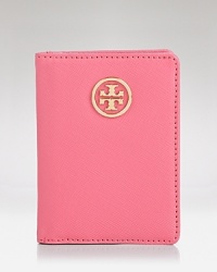 Get carded with this polished leather case from Tory Burch, which features a clear ID window, three card slots, and an understated logo detail.