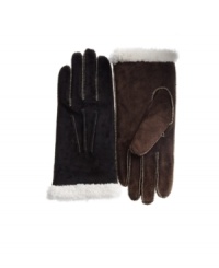 Heavy duty construction and delicate details. Contrast stitching feminizes these thickly-lined suede gloves by Isotoner.