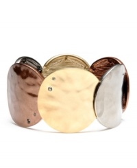 Dress them up or dress them down, these crystal-accented and antiqued discs by Kenneth Cole New York are yours to show off. Bracelet crafted from three colors of mixed metal with small crystal accents. Stretches to fit wrist. Approximate diameter: 2-1/4 inches.