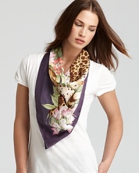 Get set for an uptown safari with this oversized jungle print Salvatore Ferragamo silk scarf, in a bold leopard and palm motif on a violet background.