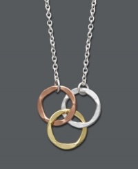 An eternal circle design that's effortlessly stylish. Studio Silver's pendant features three interlocking circles in a variety of metallics for truly versatile style. Crafted in sterling silver, 18k rose gold over sterling silver. and 18k gold over sterling silver. Approximate length: 16 inches. Approximate drop: 1/4 inch.