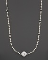 Pearls, agates and faceted white sapphire, set in sterling silver. By Elizabeth Showers.