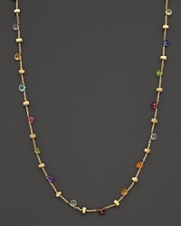 Beautiful multi-colored semi precious stones highlight this delicate 18K yellow gold necklace.