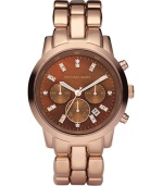 Leave understatement to someone else. Shine the brightest with this rosy Showstopper watch by Michael Kors.