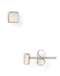 Dogeared's sterling earrings flaunt fierce angles and refined shine. From day to night, the four-sided studs structure your most feminine looks with modern edge.