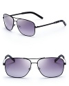 Subtle stripes along the sides bring a touch of MARC BY MARC JACOBS' signature flair to these sleek navigator shades.