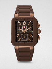 From the Jelly Bean Collection. A sporty yet sleek style with technical features in durable brown ion-plated stainless steel. Quartz movementWater resistant to 5 ATMRectangular brown ion-plated stainless steel case, 33mm (1.3) X 35.5mm (1.4)Logo accented silicone bezelBrown enamel dialNumeral and dot hour markersSecond hand Brown silicone strapImported