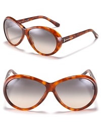 Ladies, start your engines in these Tom Ford sunglasses boasting goggle-style frames and retro glamour, Italian style.