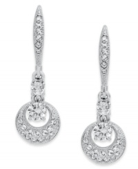 Don't drop the dazzle! Eliot Danori's elegant earrings feature intricate crystal accents and cubic zirconia (3/4 ct. t.w.) on circle drops. Set in rhodium-plated silver tone mixed metal. Approximate drop: 3/4 inch.