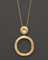 A gleaming, textured gold bead tops a striking circle on this 18K yellow gold necklace from the Jaipur Collection.