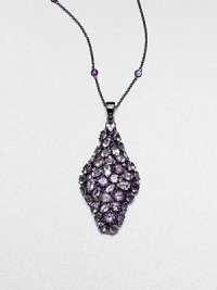 A diamond-shaped pendant encrusted with faceted amethyst stones and accented with multi-colored sapphires on an amethyst station necklace on a rhodium-plated sterling silver link chain. AmethystMulti-colored sapphiresRhodium-plated sterling silverLength, about 29Pendant size, about 2.6Clasp closureImported 