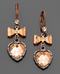 City style with a girly twist. These fabulous Betsy Johnson earrings feature rose goldtone hearts, shining pink crystals and crystal accents. Approximate drop: 1/2 inch.