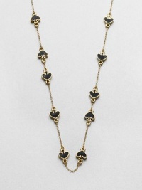 A charming piece with enamel accented stations on a link chain. EnamelGoldtoneLength, about 32Slip-on styleImported 