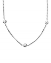 Delicate design with a touch of sparkle. Arabella's pretty necklace is set in sterling silver with seven round-cut Swarovski zirconia stations (3-1/6 ct. t.w.). Approximate length: 18 inches.