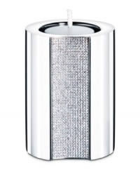 The Ambiray medium candle holder from Swarovski presents sleek, stainless steel heightened with dozens of tiny faceted clear crystals, creating a home accent that truly radiates glamour and sophistication.