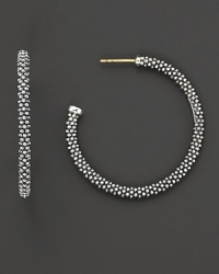 Signature sterling silver Caviar™ beaded earrings, designed by Lagos.