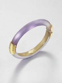 From the Lucite Collection. A sleek bangle of hand-sculpted, hand-painted Lucite, accented with crinkle-textured goldtone bands at the hinge and closure.LuciteGoldtoneDiameter, about 2.5Width, about .4Hinged, with magnetic closureMade in USA