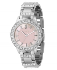 A rosy blush adds feminine fun to this richly elegant Jesse collection watch from Fossil. Silver tone stainless steel bracelet with Swarovski crystal accents. Crystal-accented round bezel. Round pink mother-of-pearl dial with logo and stick indices. Quartz movement. Water resistant to 100 meters. 11-year limited warranty.