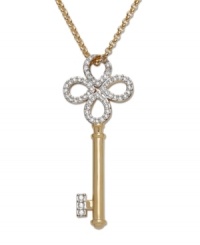 Who holds the key to your secrets? Add a touch of mystery and romance to your décolleté with this exquisite gold tone mixed metal pendant! The delicately crafted key sparkles in clear Swarovski crystals set in pavé. Approximate length: 27-1/2 inches. Approximate drop: 1-7/8 inches.